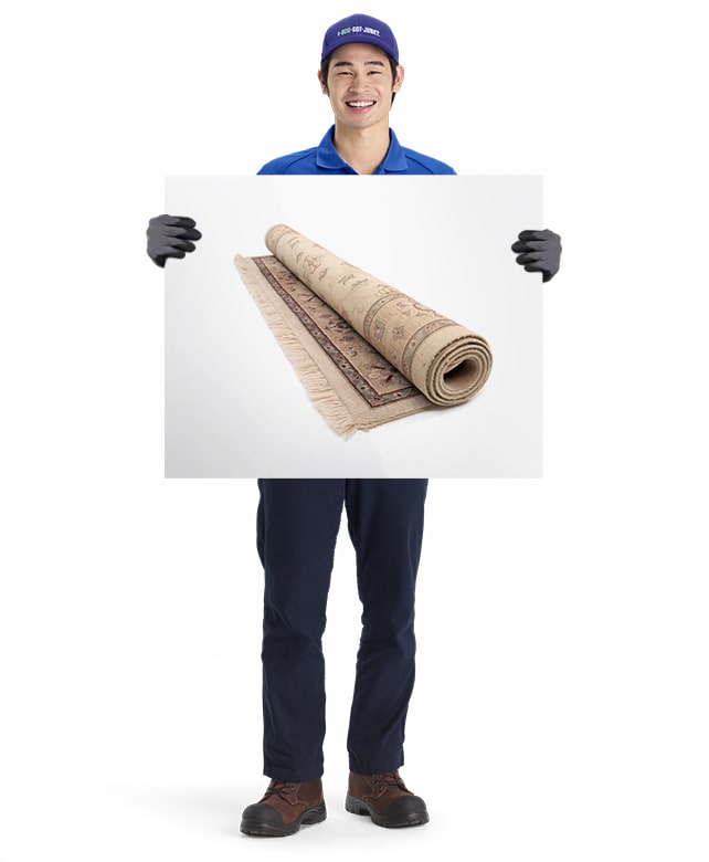 Carpet for removal and disposal by 1-800-GOT-JUNK? truck team member