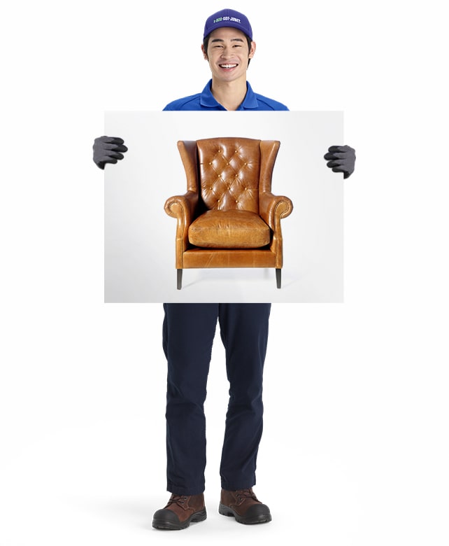 Furniture for removal and disposal by 1-800-GOT-JUNK? truck team member