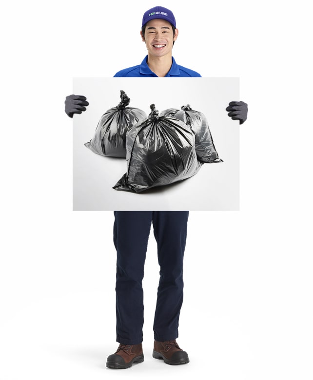 Garbage Refuse Rubbish and Junk for removal and disposal by 1-800-GOT-JUNK? truck team member